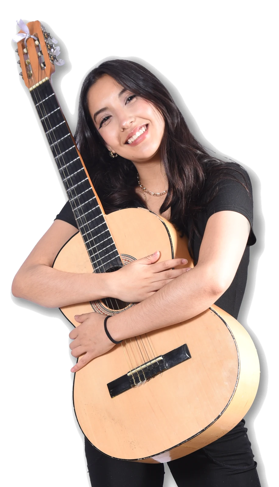 Estudiante de DEART sonriendo con su guitarra